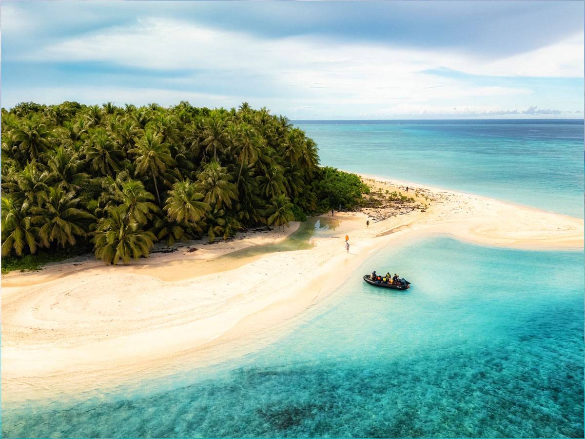 White sand beach with clear blue water