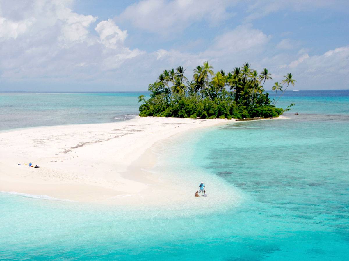 White sand beach with clear blue water