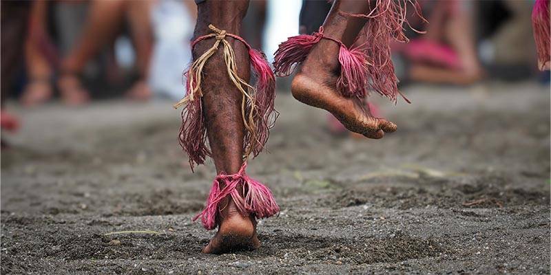 image of feet in traditional dress dancing